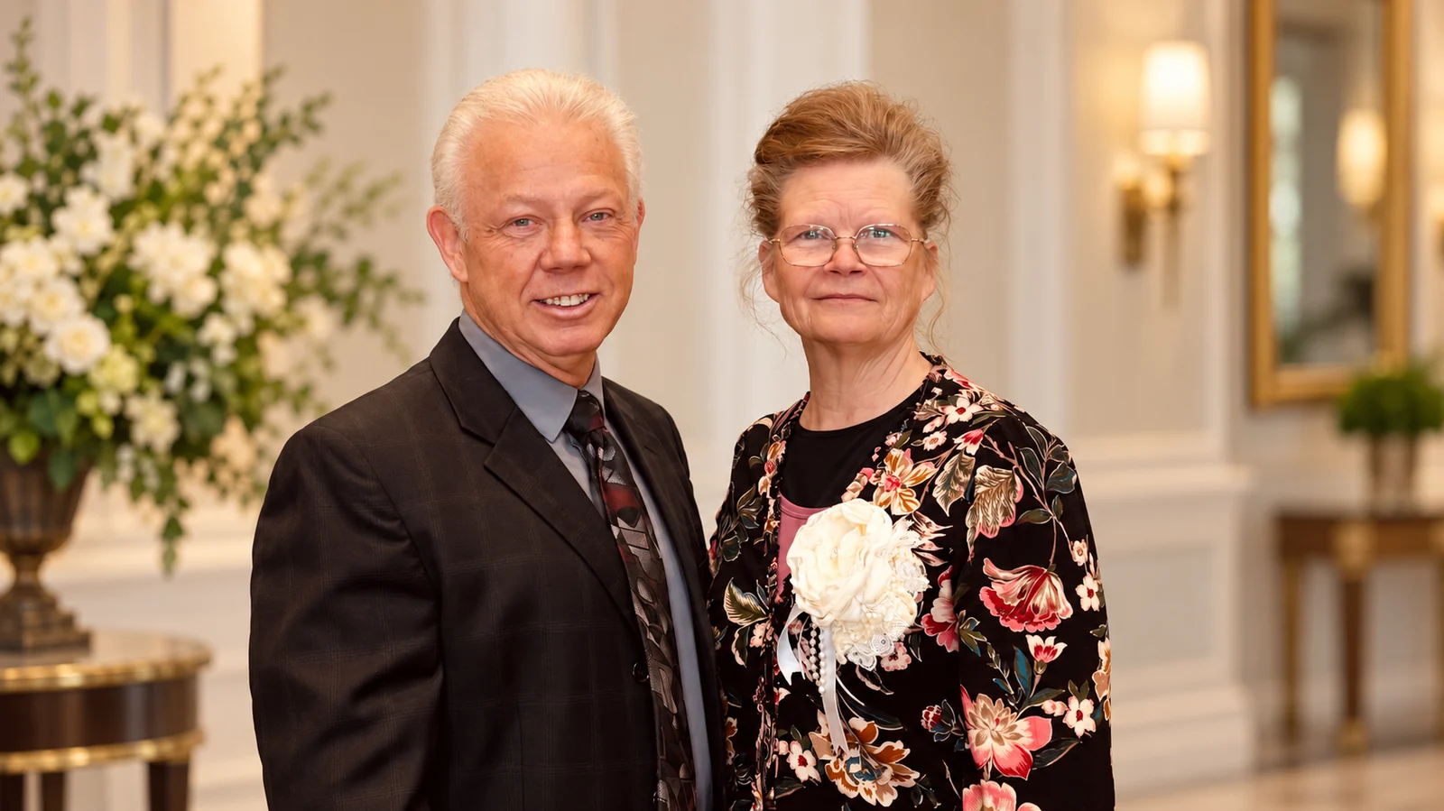 Gordon Brake in a formal portrait with a woman beside him