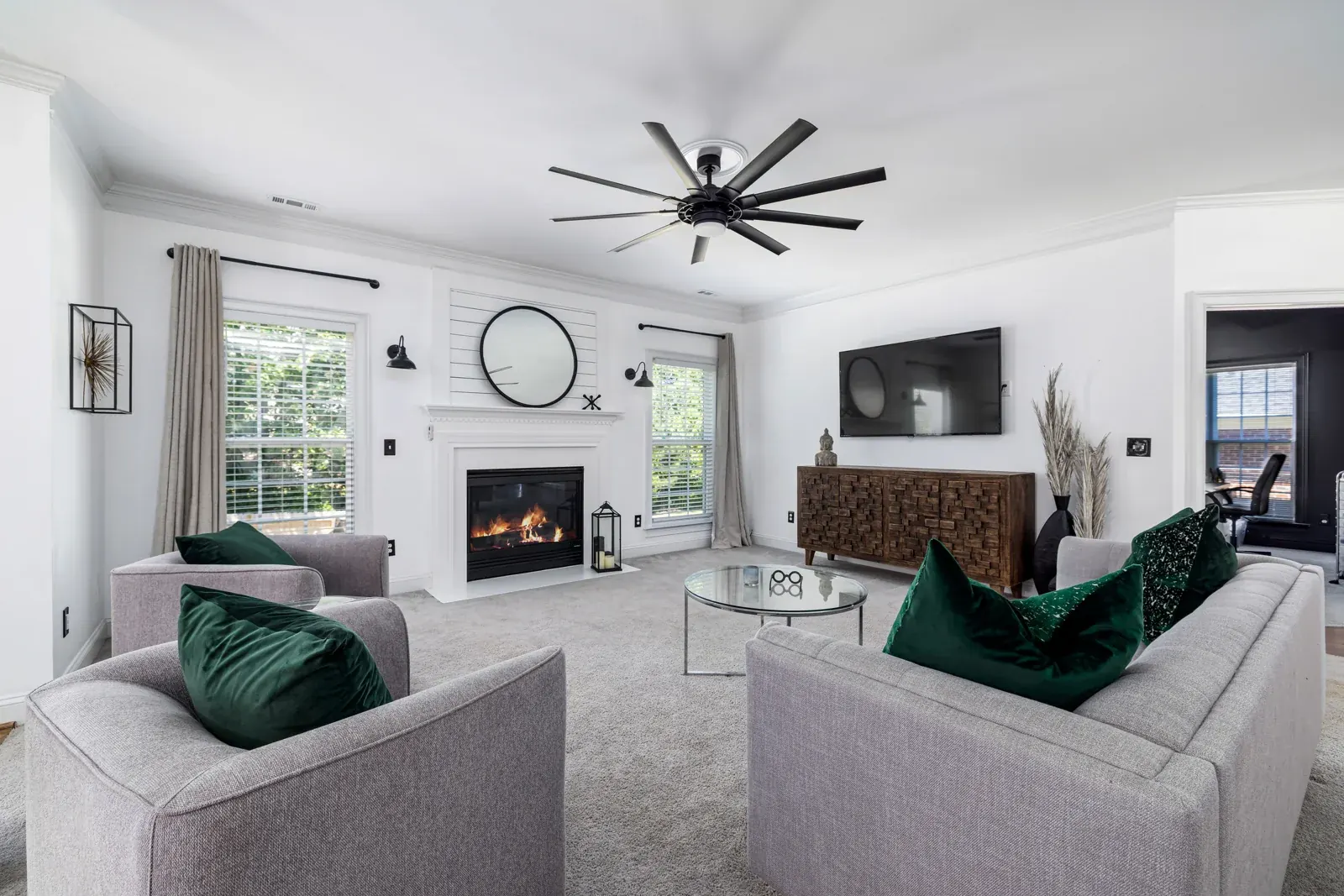Comfortable living room with fresh carpet and natural light